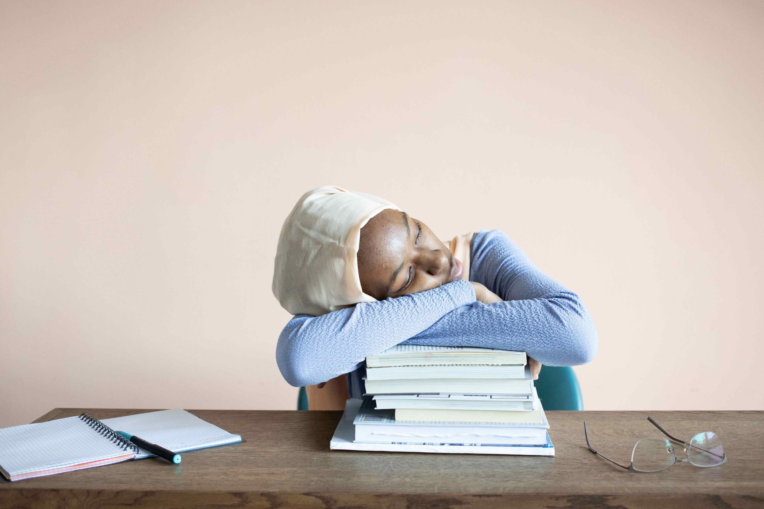 student tired after long lecture days 